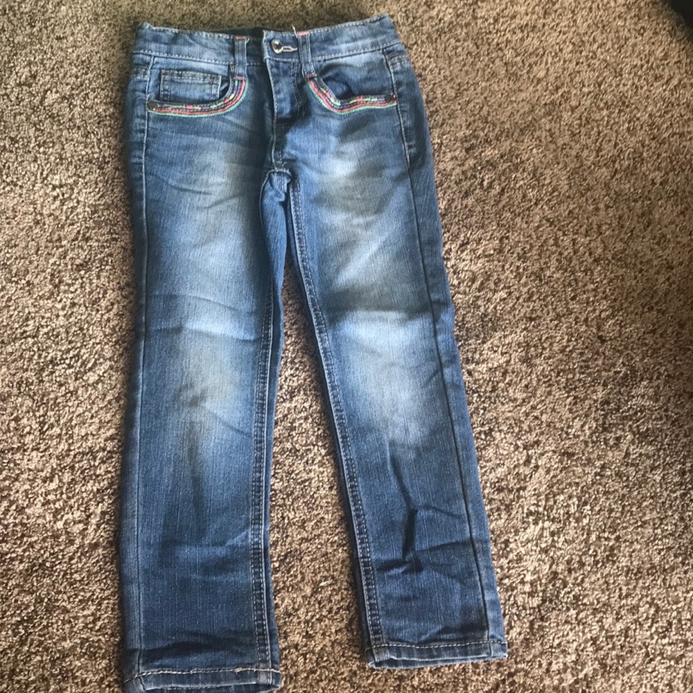 Girls skinny jeans with heart pockets, size 5
